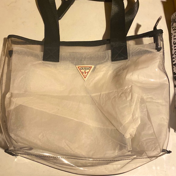 Guess Handbags - NWT Clear Guess bag and make up bag